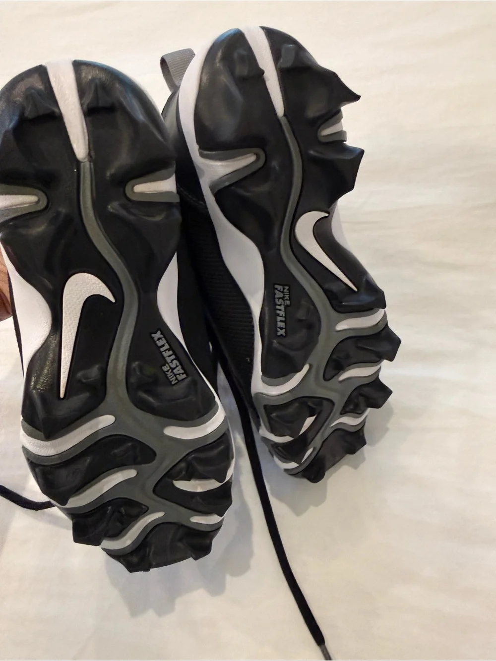 Kids Nike Black Athletic Cleats with White Accents size 1 like new